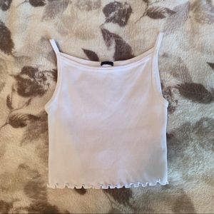 white cropped tank top with lettuce edge hemming